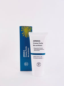 Arnika Creme Forte – mit speziellem Extrakt aus den Blüten der Bergarnika. Erhältlich im Shop der Helios Apotheke Klosters.